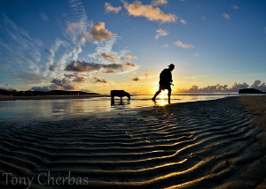 Sunset at Jimmy Dee's, Guam by Tony Cherbas 